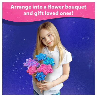 Young girl holding a colorful craft flower bouquet from Poke-in Art for Kids