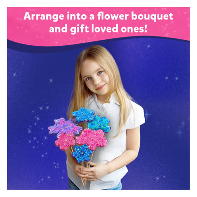 Young girl holding colorful sparkly craft flowers from DIY Delights Poke-in-Art Combo