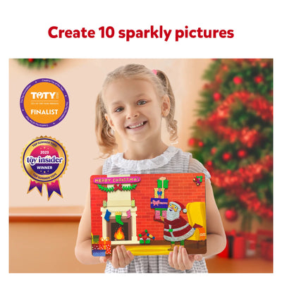 Young girl holding a holiday craft board with Santa and Fireplace from Triple the Foil Fun Bundle