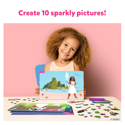 Young girl holding Moana-themed craft kit with colorful pieces on table for Foil Fun Disney Princess art kit