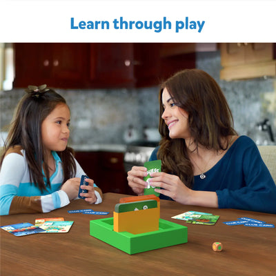 Two people playing Guess in 10 Combo Animal Planet and Countries of the World board game