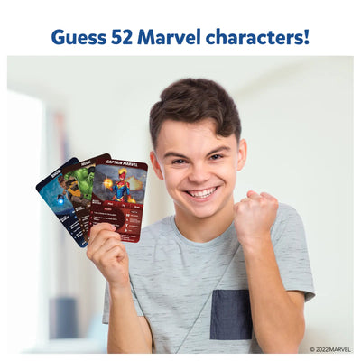 Young boy holding three Marvel character playing cards from Guess in 10 Marvel trivia game