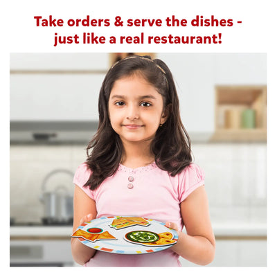 Young girl playing with Let’s Play Restaurant Magnetic Pretend Play Set with food items