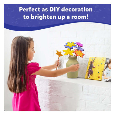 Young girl arranging colorful flower-shaped DIY decorations in a vase for DIY Delights Poke-in-Art Combo