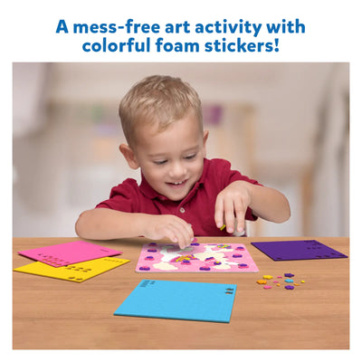 Young boy happily creating art with colorful foam puppy stickers from Fun with Foam product