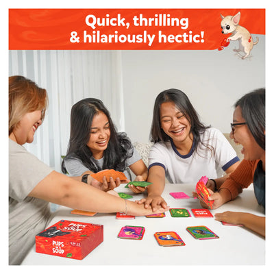 Four young women playing Pups in a Soup fast-paced card game for ages 8+