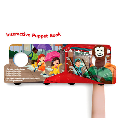 Interactive puppet book shaped like a red bus with a monkey finger puppet for children