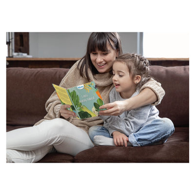 Woman and child sharing a storybook from Lolas Healthy Habits Fun Learning Storybooks