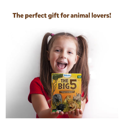 Young girl joyfully presenting The Big 5 African animals themed card game