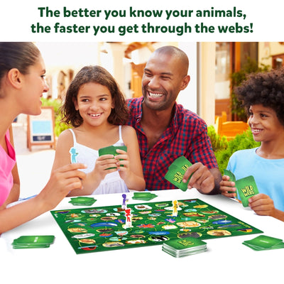 Family playing Wild Webs Animal Learning Board Game with cards and player pieces