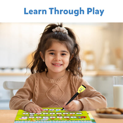 Young girl smiling using yellow and black electronic learning pen on colorful educational mat